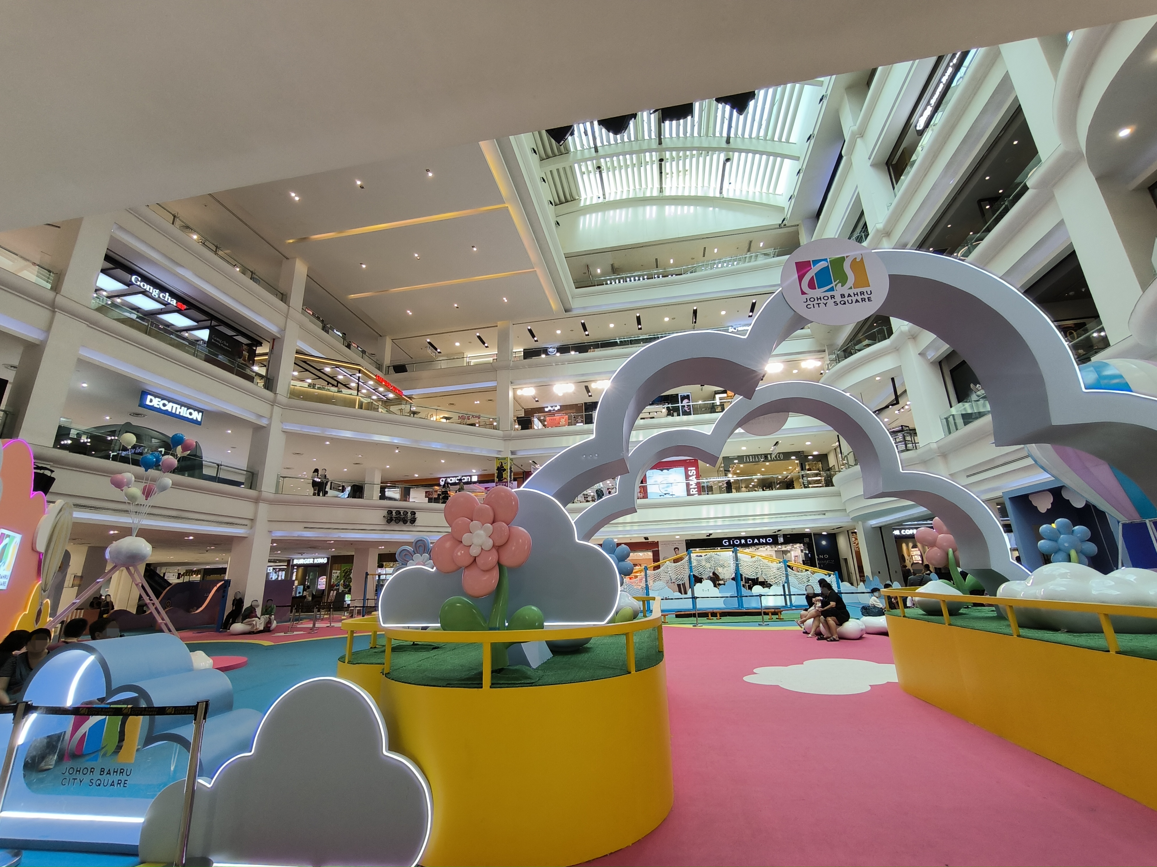 Johor Bahru City Square mall interior as shopping-trip context, not a vehicle pickup point